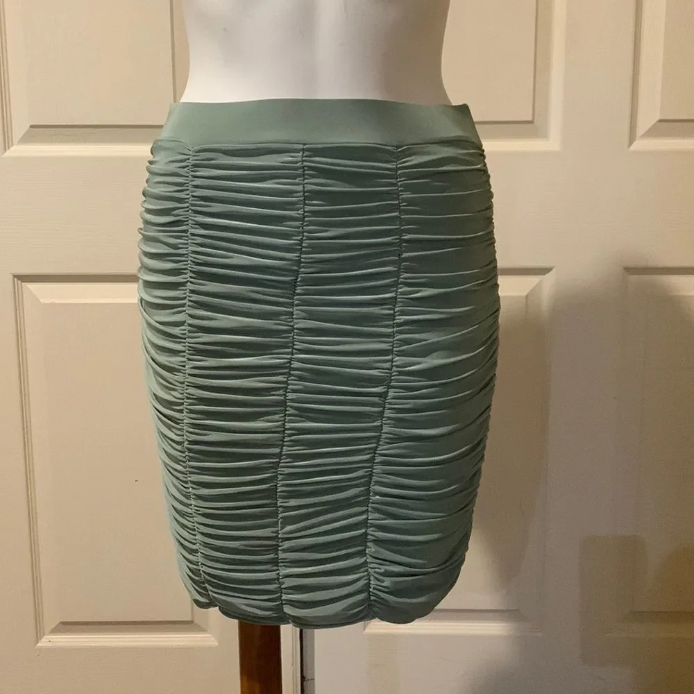 Club London Mini skirt sage. NWT. Size 6